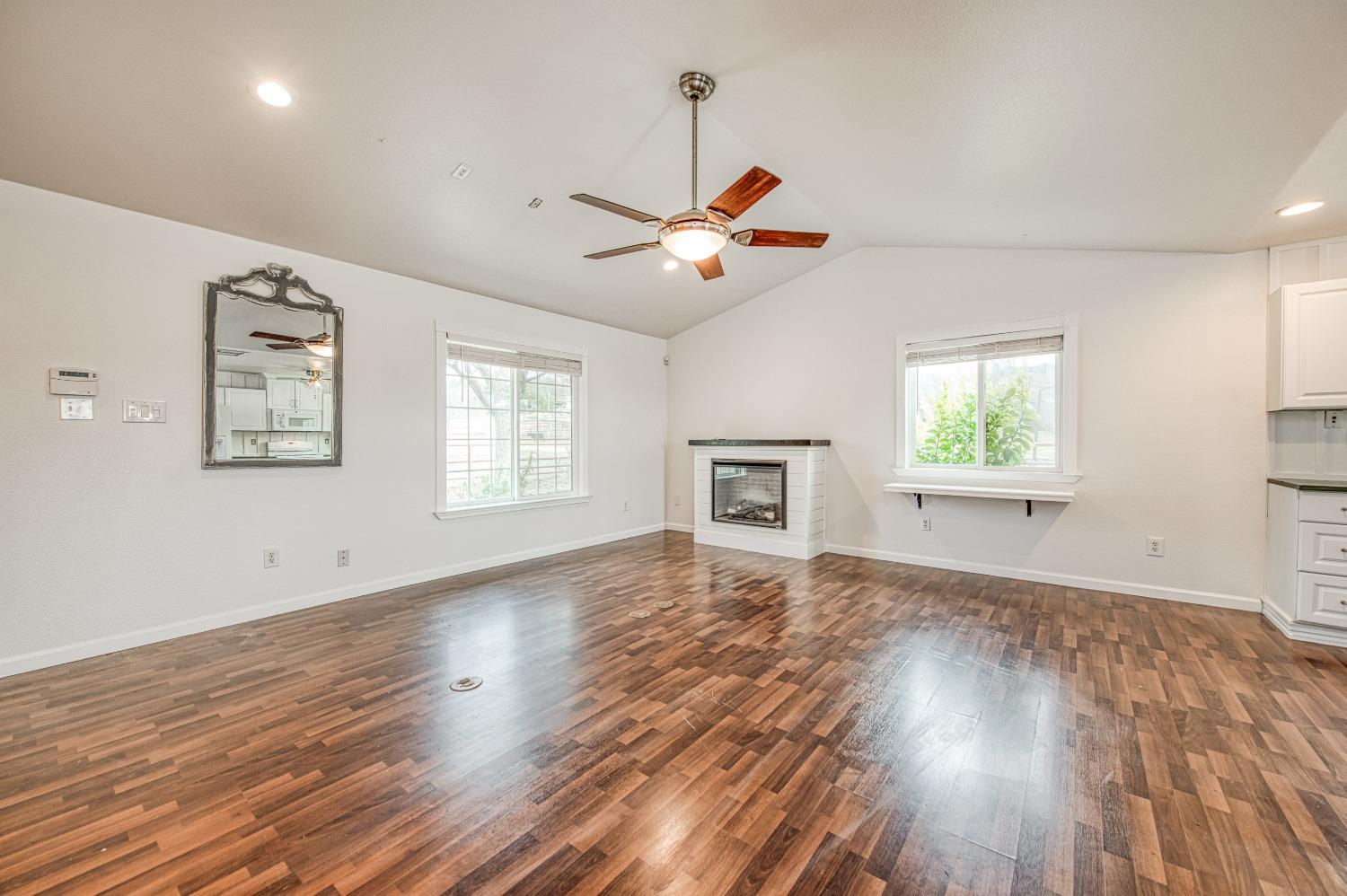 30128 Auberry Road Prather, CA 93651 - Photo 62 of 99 a view of empty room with wooden floor and fan