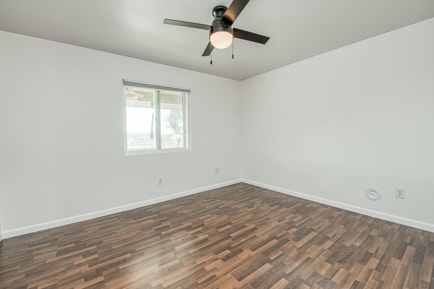 30128 Auberry Road Prather, CA 93651 - Photo 68 of 99 wooden floor in an empty room with a window