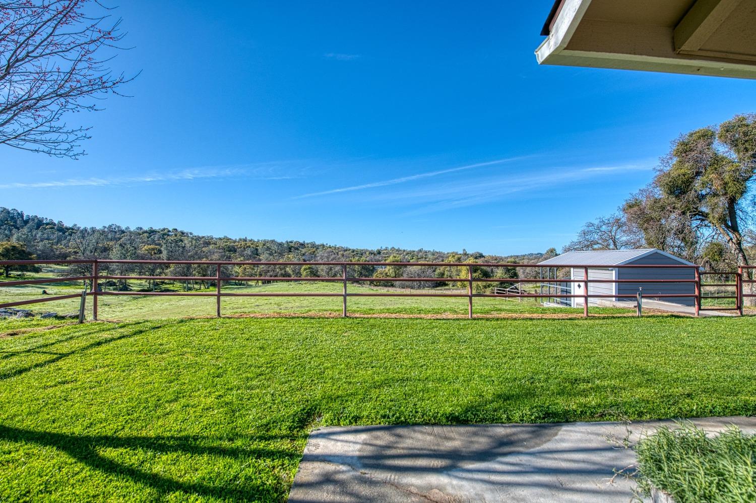 30128 Auberry Road Prather, CA 93651 - Photo 71 of 99 a view of a golf course with a lake view