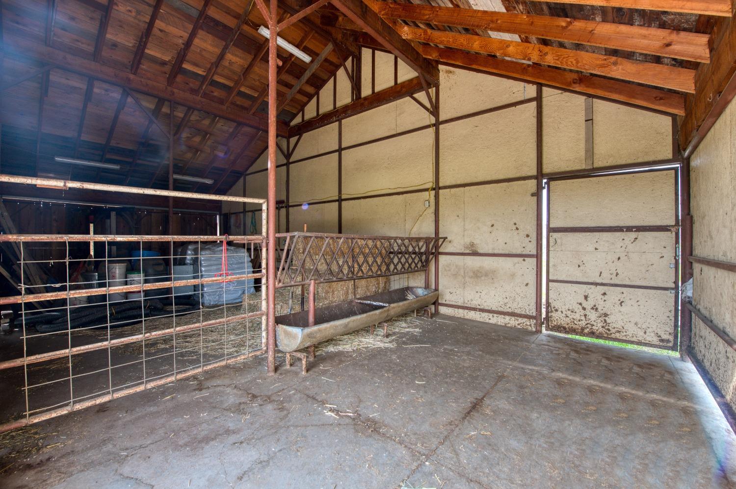 30128 Auberry Road Prather, CA 93651 - Photo 85 of 99 a view of an empty room with racks on the wall