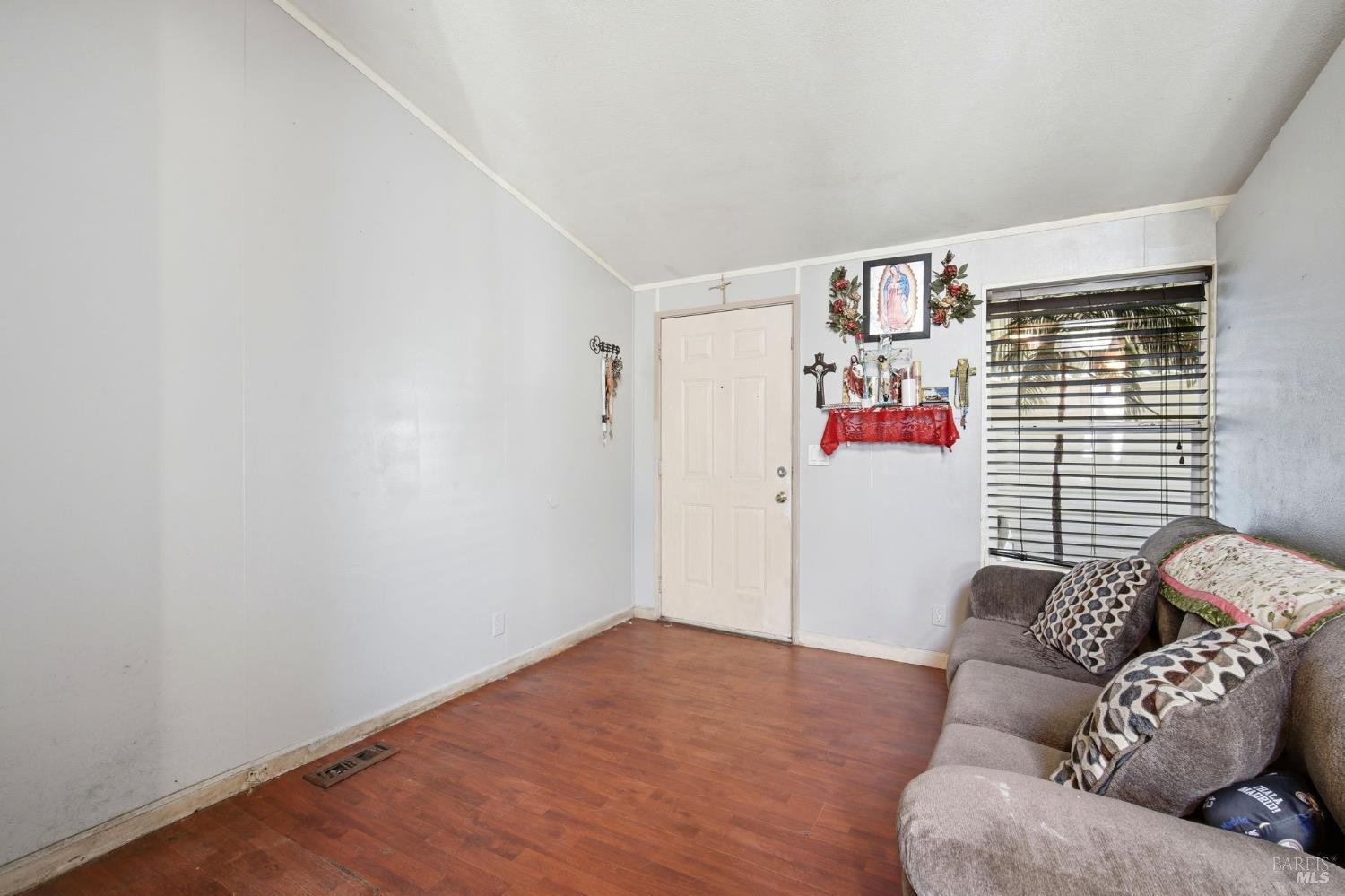 2963 Santa Rosa Avenue, Unit B2 Santa Rosa, CA 95407 - Photo 6 of 32 a living room with furniture and a window