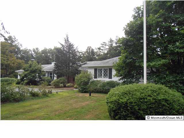 89 Rumson Road Rumson, NJ 07760 - Photo 3 of 9 a black and white photo of a house