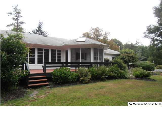 89 Rumson Road Rumson, NJ 07760 - Photo 5 of 9 a black and white photo of a house