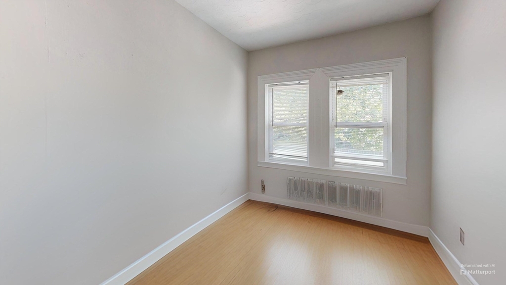 1789 Commonwealth Avenue, Unit 2 Boston, MA 02135 - Photo 5 of 16 an empty room with a window