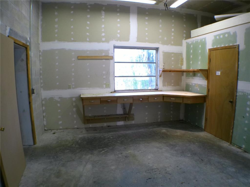 415 Southeast 123rd Street Road Ocala, FL 34480 - Photo 46 of 50 a bathroom with a sink and a mirror