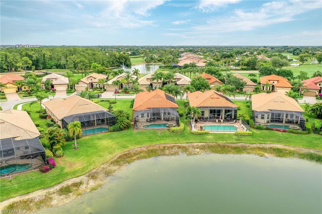 6581 Caldecott Drive Naples, FL 34113 - Photo 27 of 34 a view of house with garden space and street view