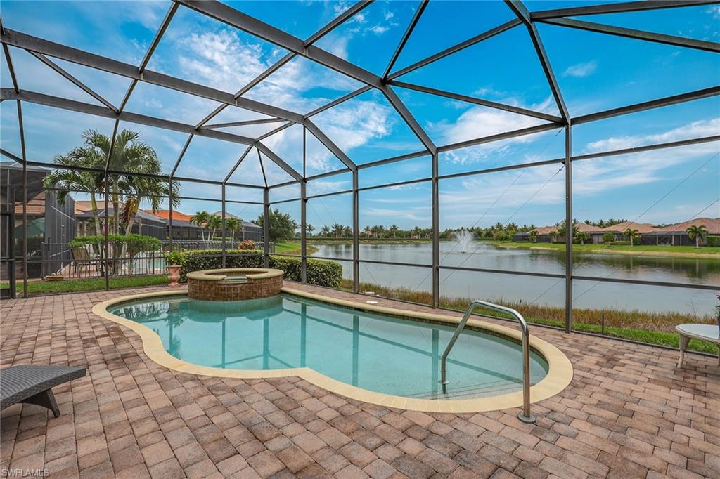 6581 Caldecott Drive Naples, FL 34113 - Photo 33 of 34 a view of a backyard with a small deck