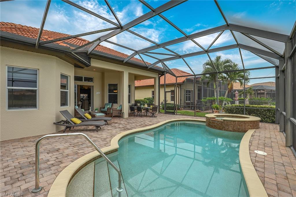 6581 Caldecott Drive Naples, FL 34113 - Photo 34 of 34 a view of a backyard with swimming pool
