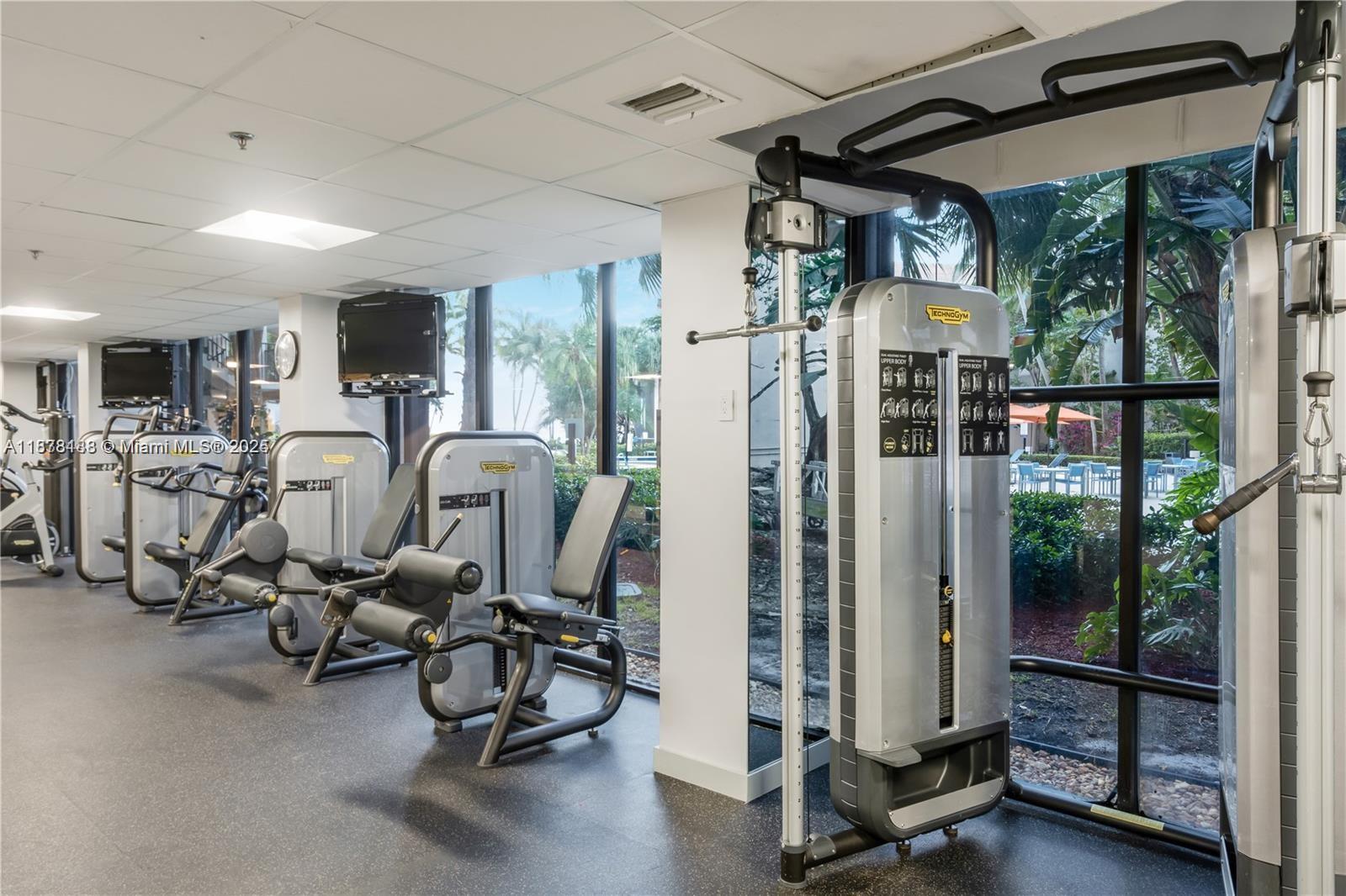 540 Brickell Key Drive, Unit 811 Miami, FL 33131 - Photo 6 of 26 a view of a room with gym equipment