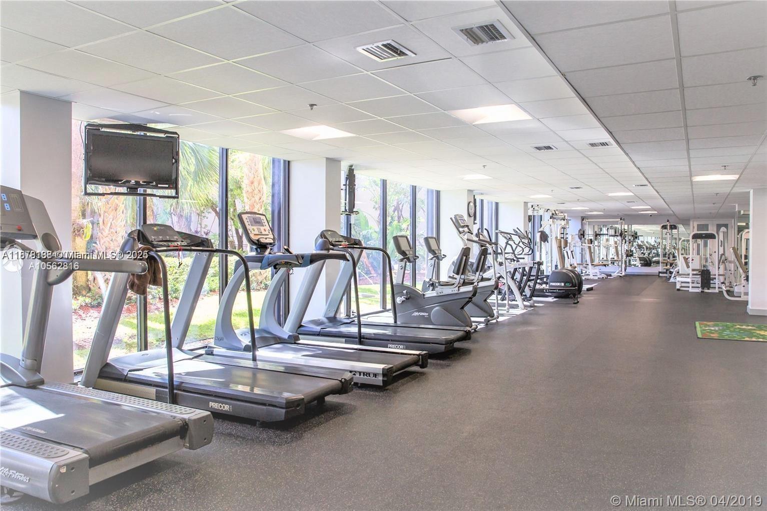 540 Brickell Key Drive, Unit 811 Miami, FL 33131 - Photo 7 of 26 a view of a room with gym equipment