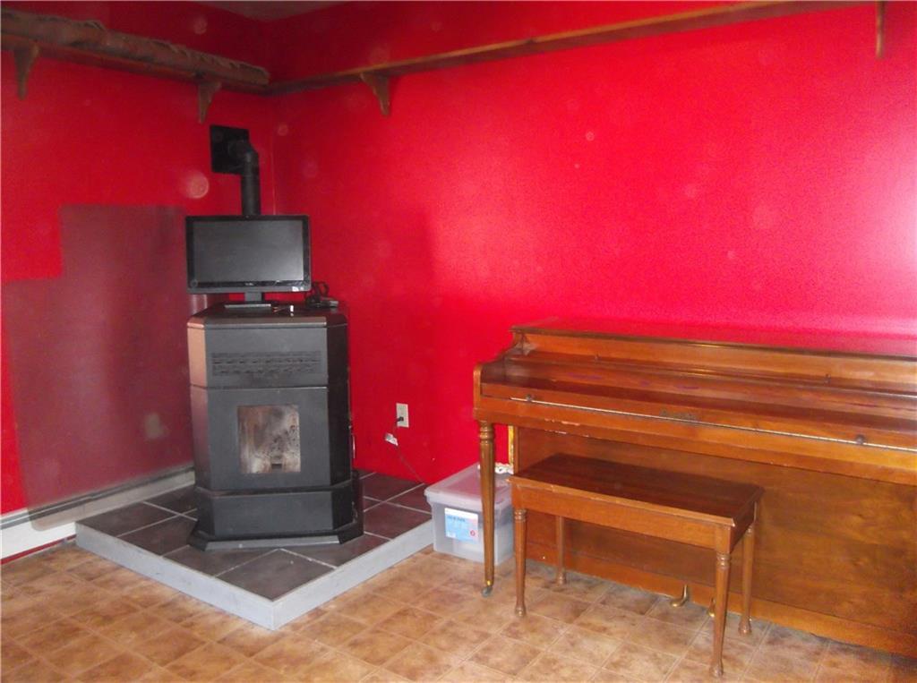 213 Anderson Road Dover Foxcroft, ME 04426 - Photo 15 of 21 Pellet stove conveys with property. ...