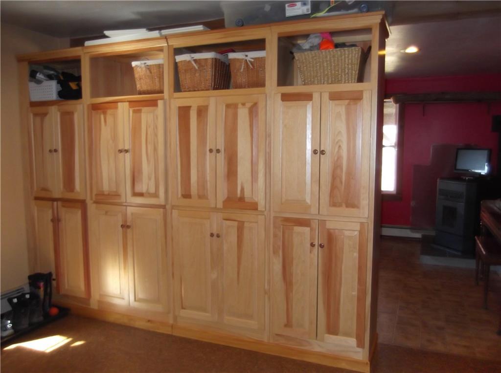 213 Anderson Road Dover Foxcroft, ME 04426 - Photo 16 of 21 Cabinet used as a room divider. ...