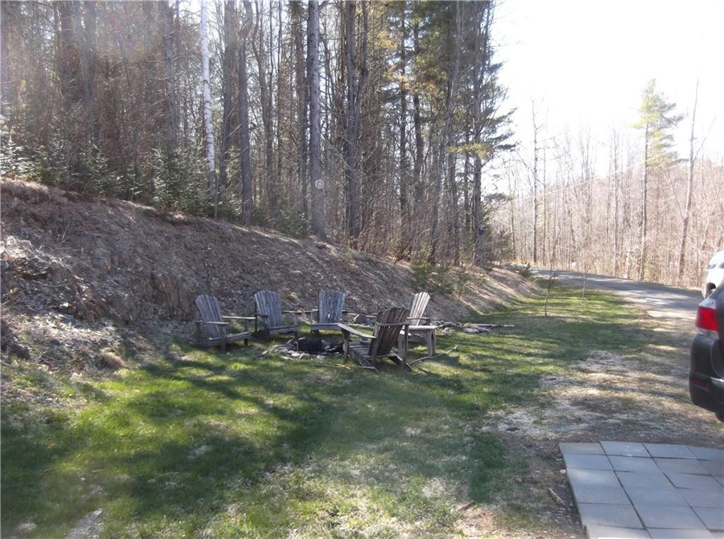 213 Anderson Road Dover Foxcroft, ME 04426 - Photo 20 of 21 Front with fire pit.