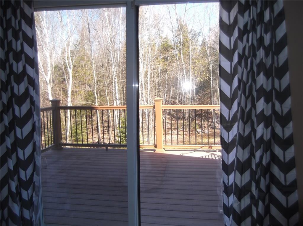 213 Anderson Road Dover Foxcroft, ME 04426 - Photo 7 of 21 View of deck off master bedroom.