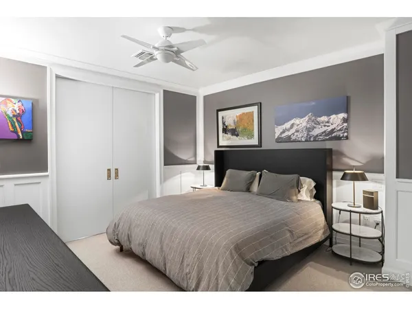 a bedroom with furniture and window