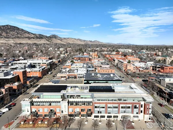 a view of city with tall buildings