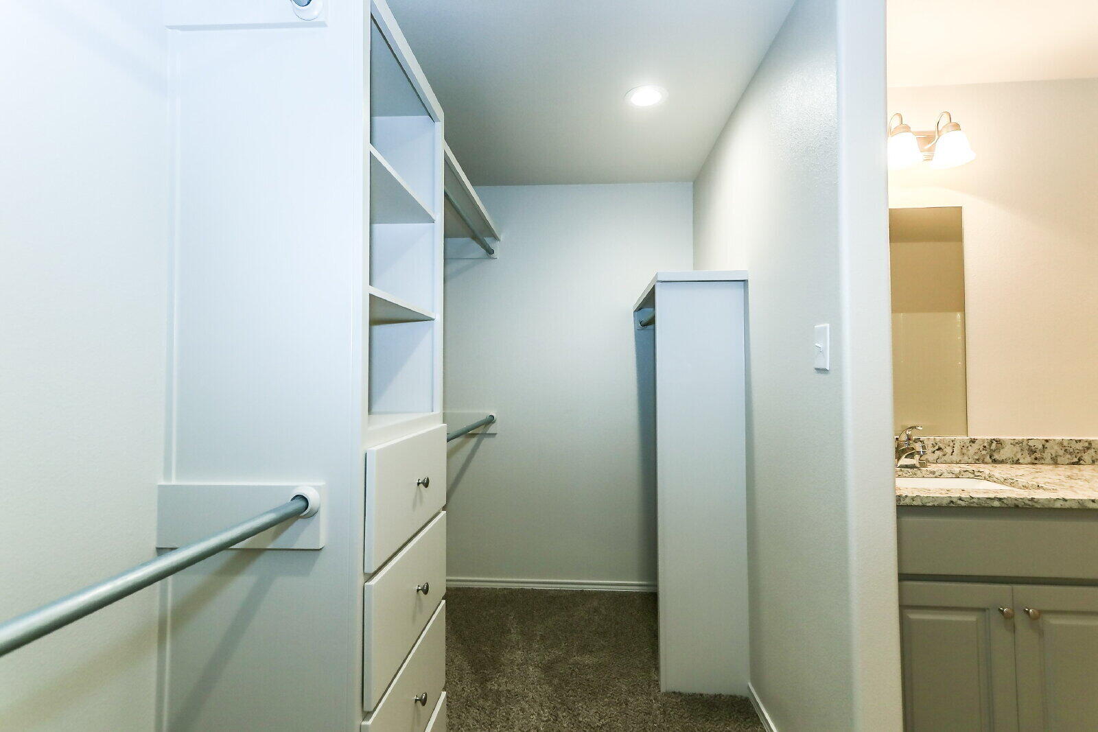 6903 67th Street, Unit A Lubbock, TX 79424 - Photo 24 of 32 a view of walk in closet