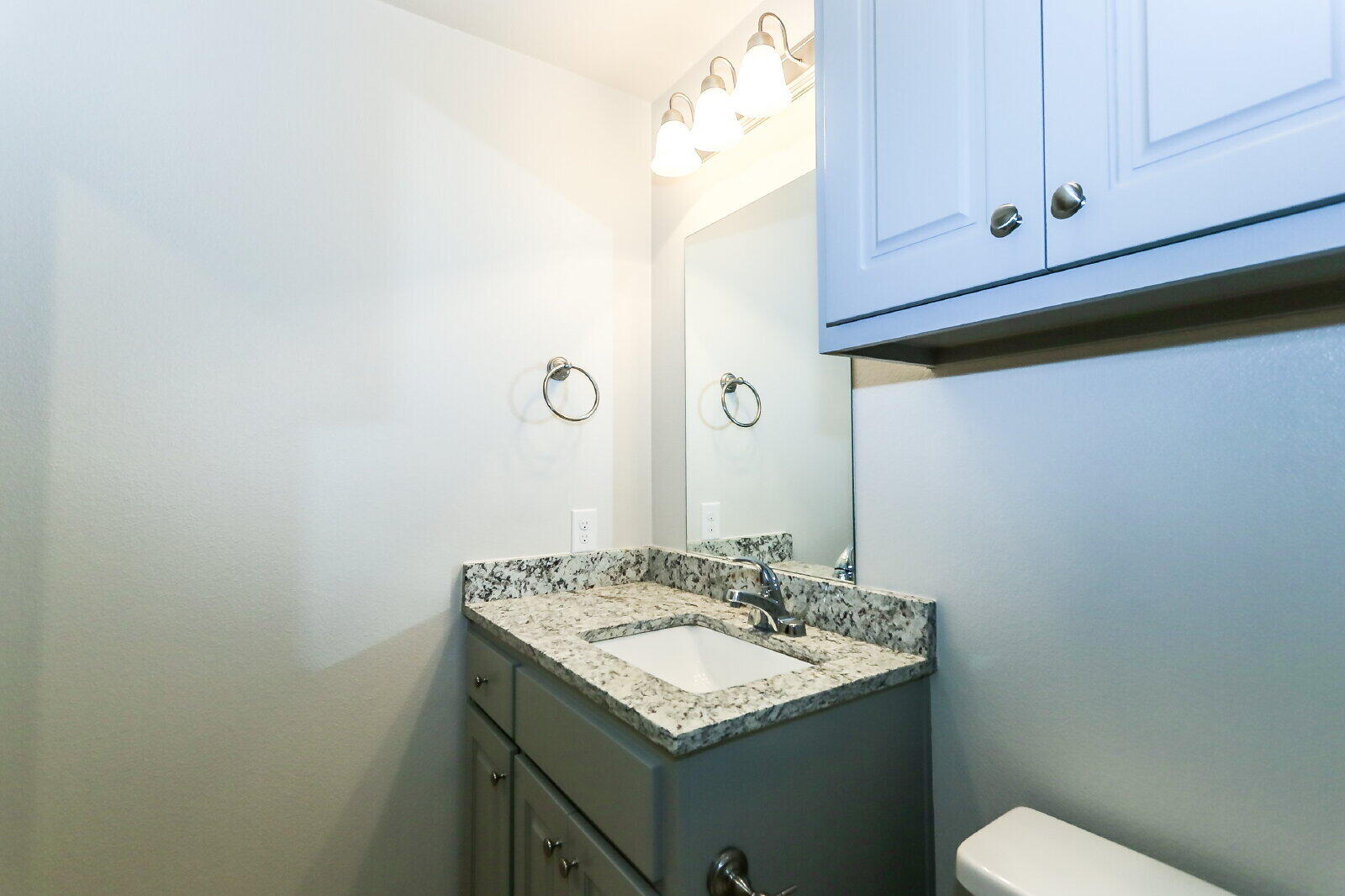 6903 67th Street, Unit A Lubbock, TX 79424 - Photo 30 of 32 a bathroom with a sink and a toilet