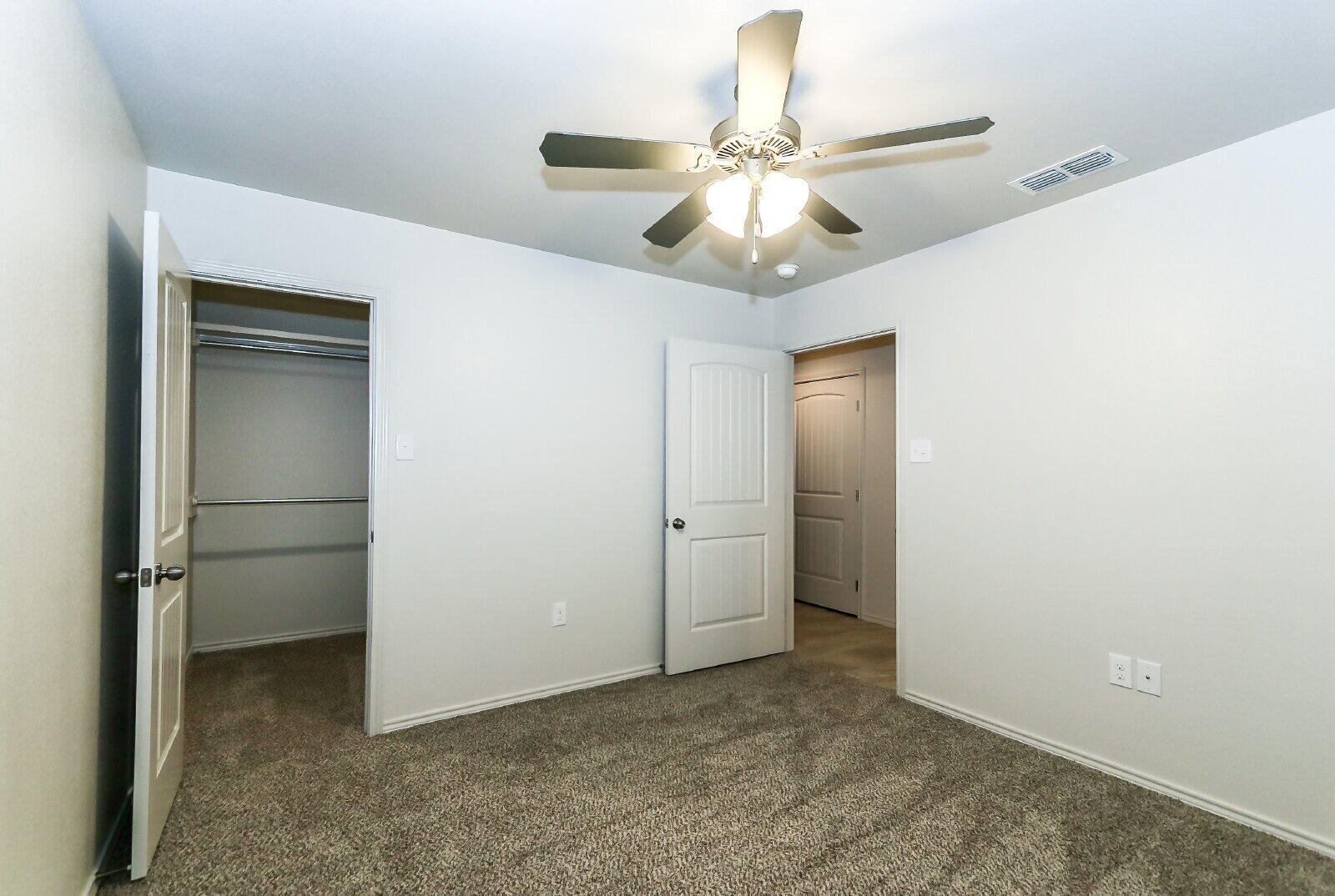 6903 67th Street, Unit A Lubbock, TX 79424 - Photo 32 of 32 wooden floor in an empty room
