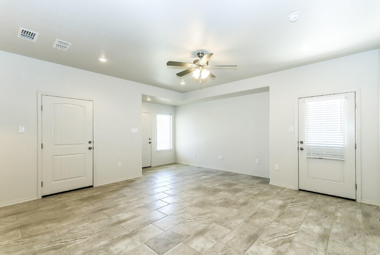 6903 67th Street, Unit A Lubbock, TX 79424 - Photo 6 of 32 a view of an empty room