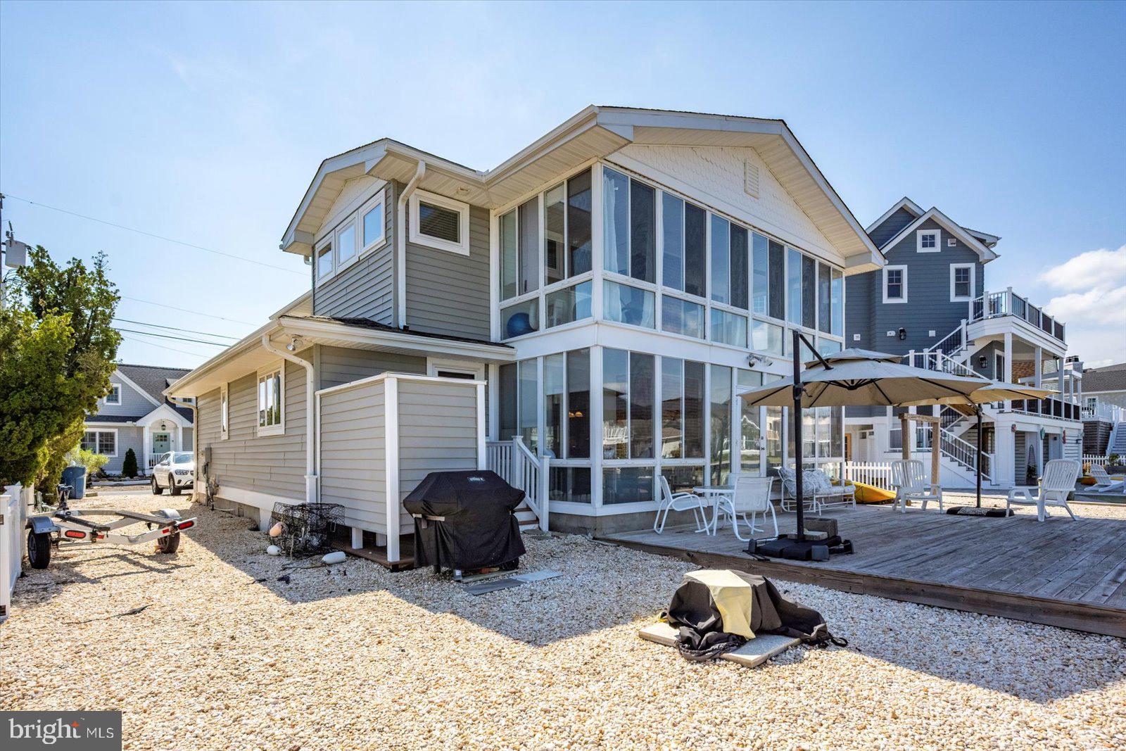 409 Bristol Road South Bethany, DE 19930 - Photo 66 of 89 Rear Exterior with Outdoor Shower