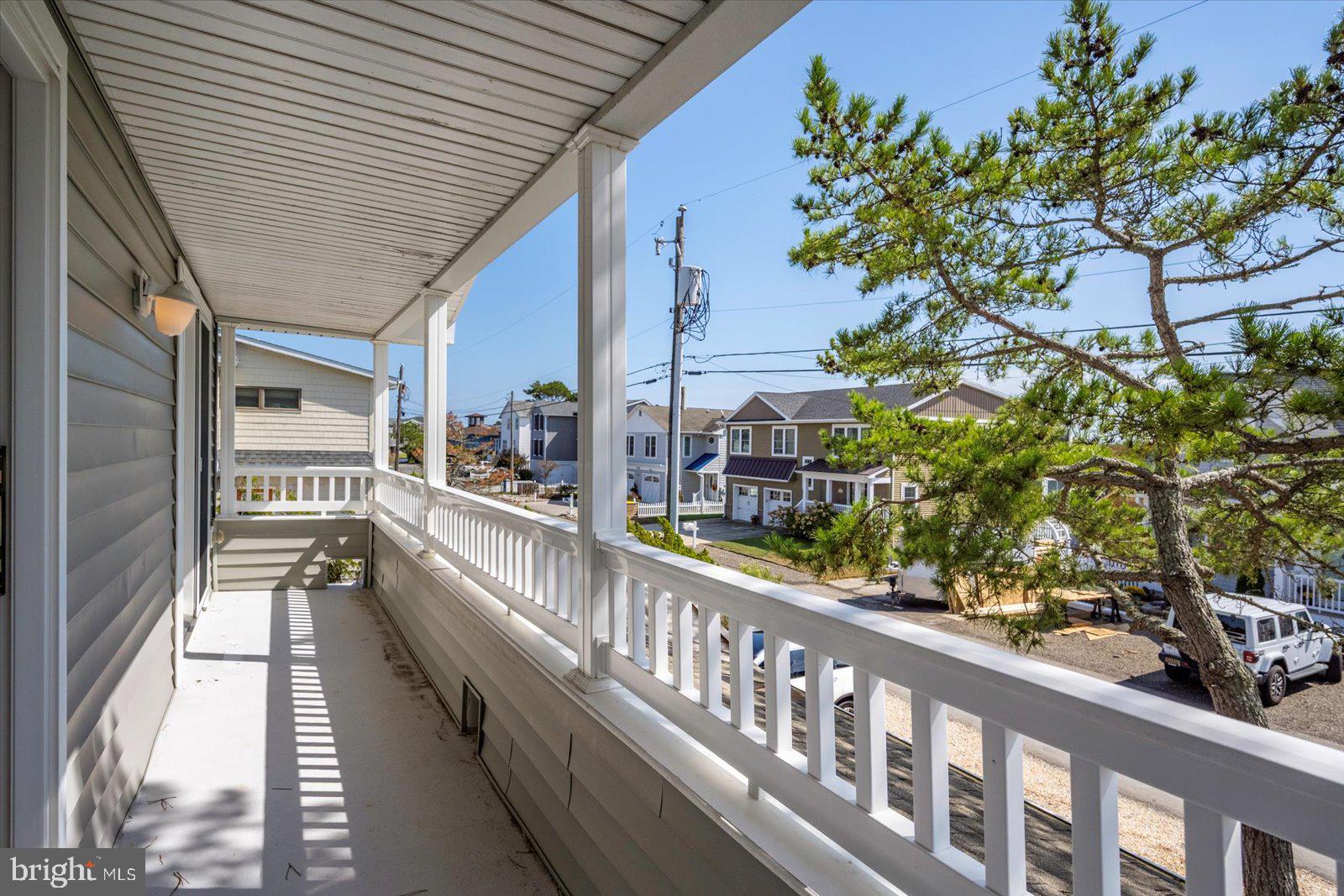 409 Bristol Road South Bethany, DE 19930 - Photo 76 of 89 Front 2nd Floor Balcony