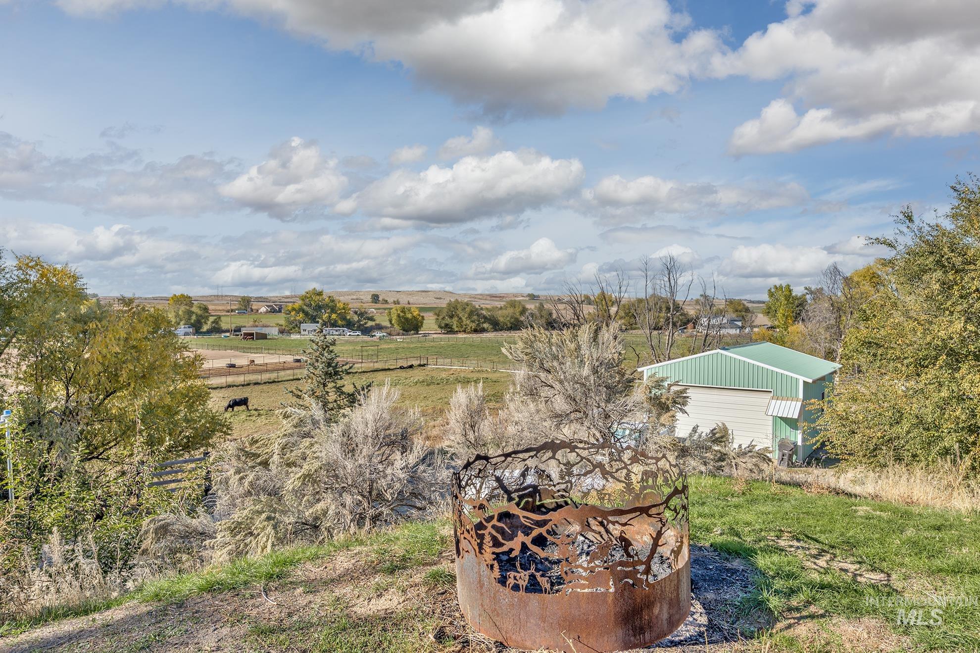 28552 Market Road Caldwell, ID 83607 - Photo 30 of 50 View of yard with an outdoor structure and a view of rural / pastoral area