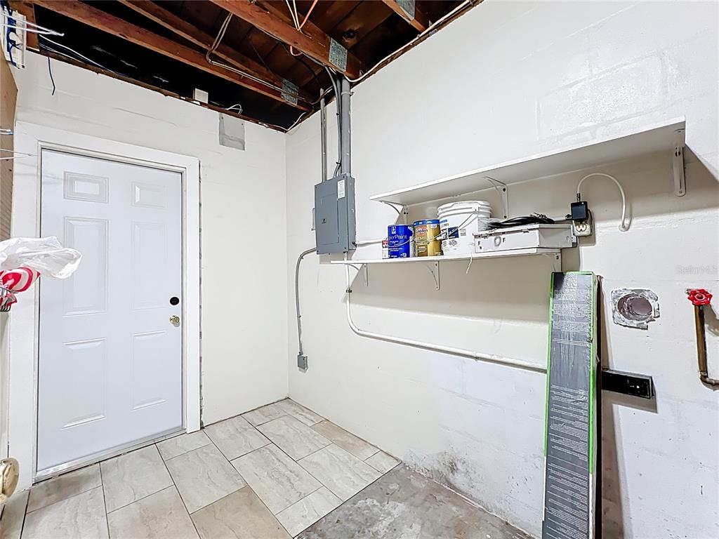 12295 Ridge Road Largo, FL 33778 - Photo 18 of 31 a utility room with dryer and washer