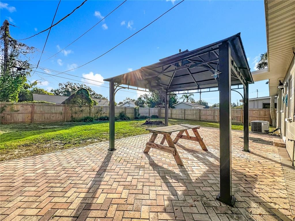 12295 Ridge Road Largo, FL 33778 - Photo 20 of 31 a view of a backyard with sitting area
