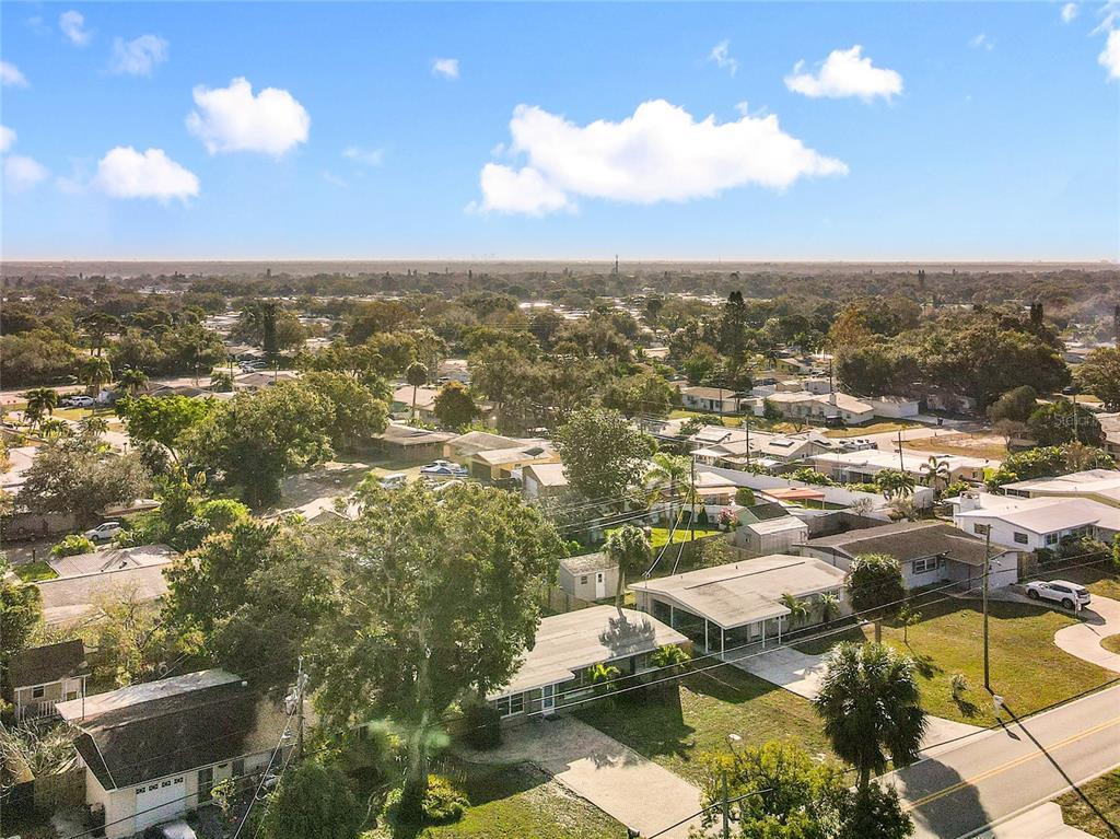 12295 Ridge Road Largo, FL 33778 - Photo 27 of 31 an aerial view of residential building with parking space