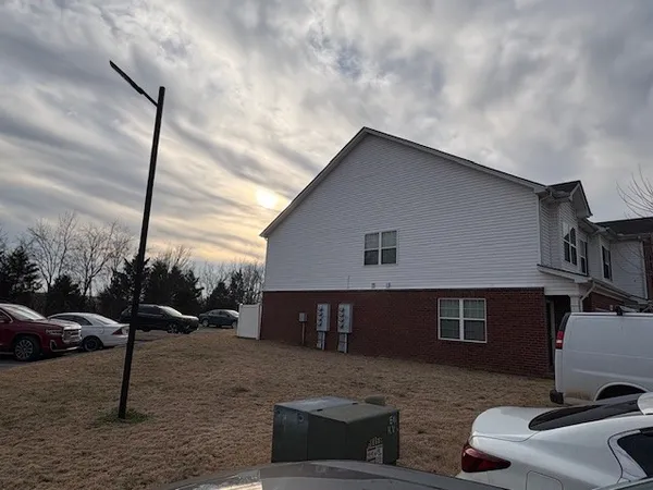 a view of house with outdoor space