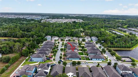 an aerial view of a city with lots of residential buildings