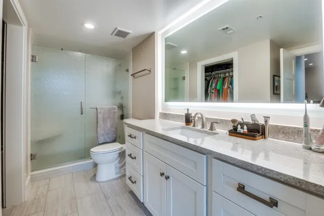 a view of parking garage with cars