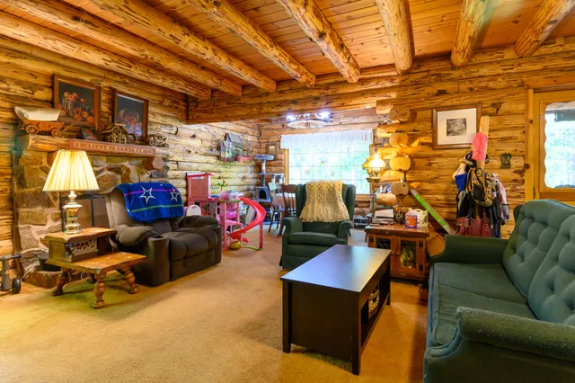 a living room with furniture and a couch