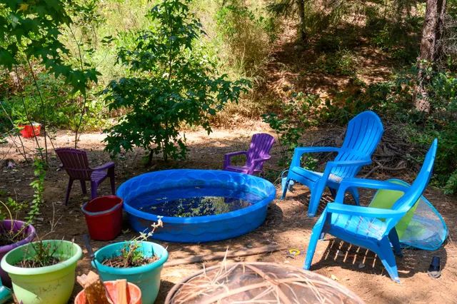 a view of a balcony with chairs