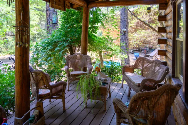 a view of balcony with outdoor seating and city view