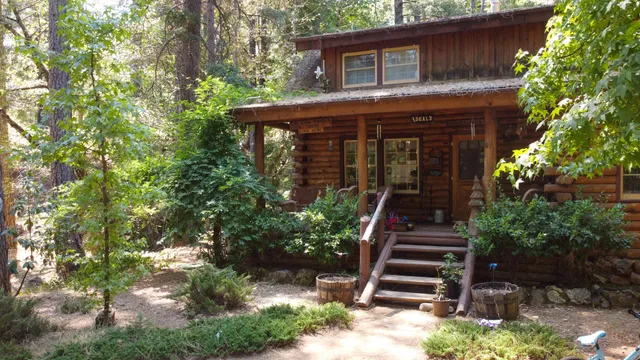 a front view of a house with stairs