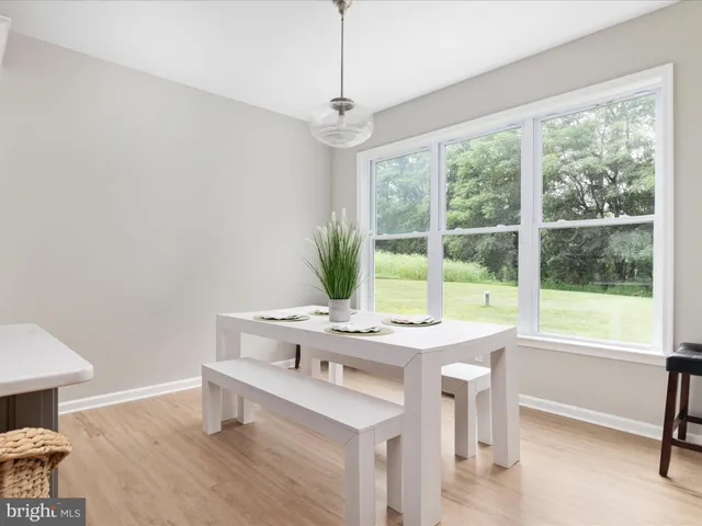 a room with furniture and a window