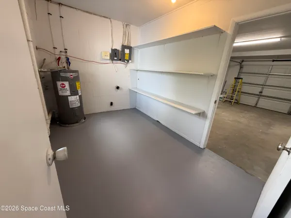 a view of storage and utility room