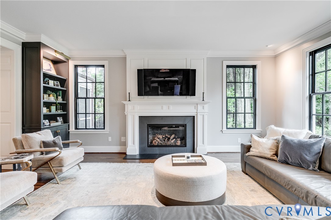 6 Berkshire Road Richmond, VA 23221 - Photo 23 of 66 a living room with furniture a fireplace and window