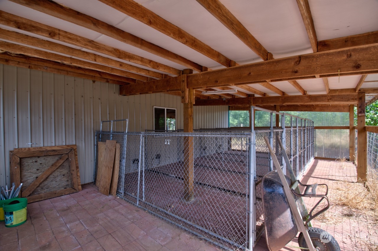 145 Fay Road Chehalis, WA 98532 - Photo 4 of 40 a view of a garage with wooden wall