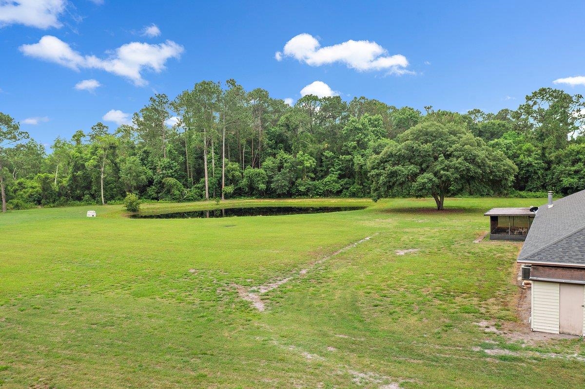 2670 Cabbage Hammock Road St. Augustine, FL 32092 - Photo 23 of 28 a view of a field with a big yard