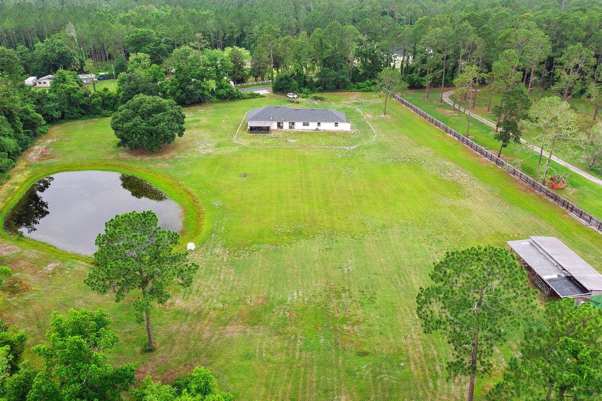 2670 Cabbage Hammock Road St. Augustine, FL 32092 - Photo 26 of 28 a view of a yard with swimming pool