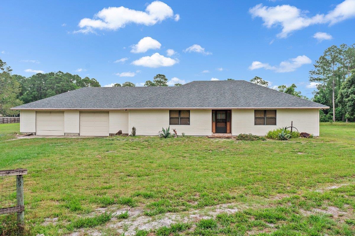 2670 Cabbage Hammock Road St. Augustine, FL 32092 - Photo 3 of 28 a view of a yard with a house