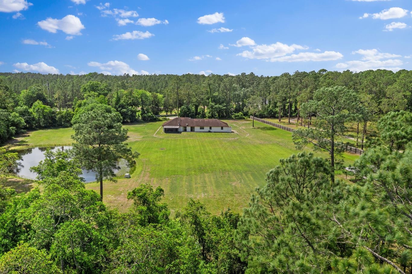2670 Cabbage Hammock Road St. Augustine, FL 32092 - Photo 5 of 28 a view of a city with lush green forest