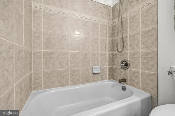 a bathroom with a bathtub