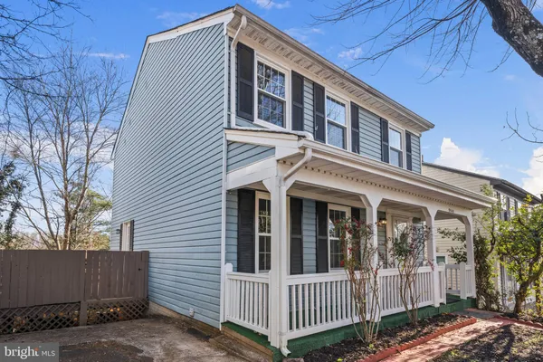 a front view of a house with a porch