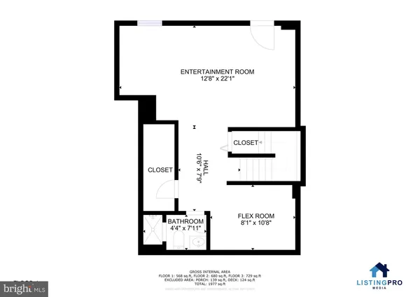 a picture of a bench in front of a white house