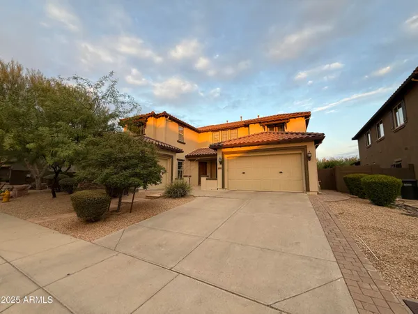 a view of a house with a patio