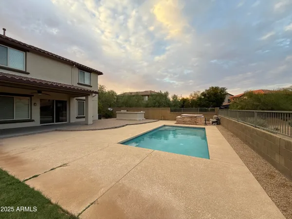 a view of outdoor space and swimming pool